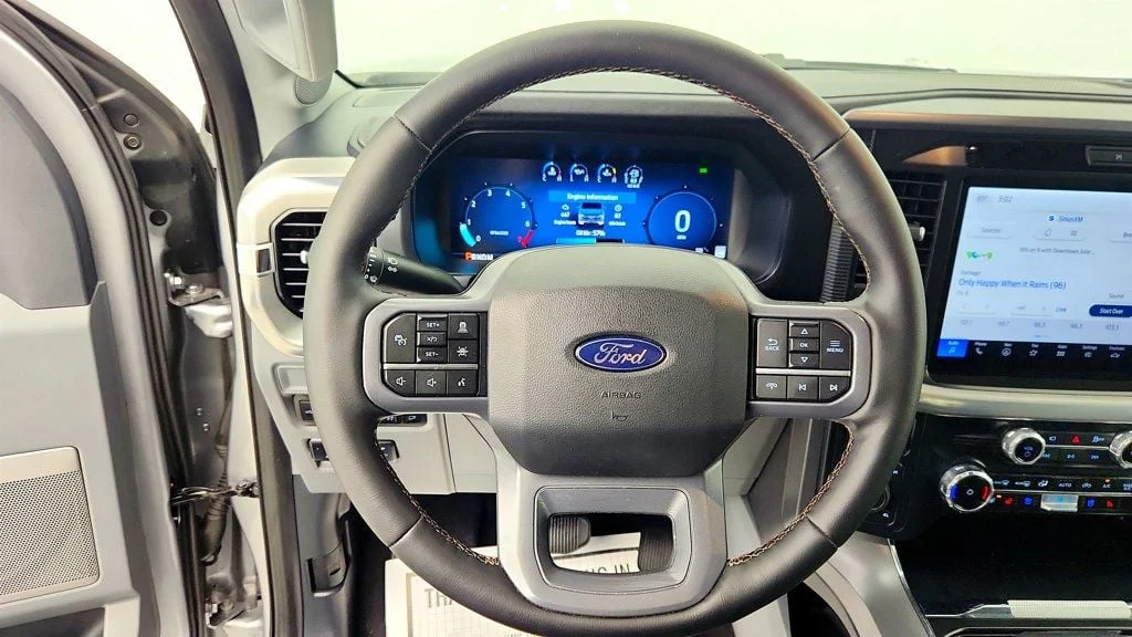 Used 2025 Iconic Silver Metallic Ford LARIAT 4WD SuperCrew 6.5
