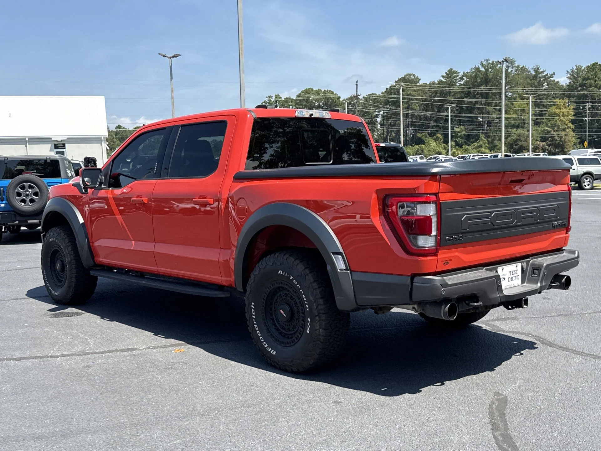 Certified Used 2023 Orange Metallic Ford Raptor image 15