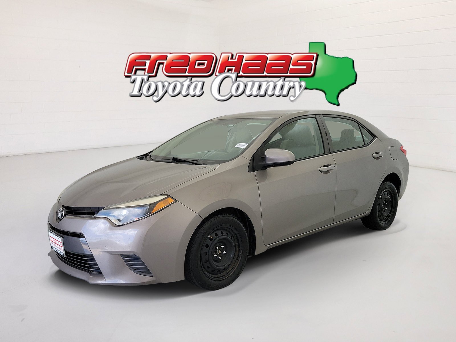 Used 2016 Brown Toyota LE image 1