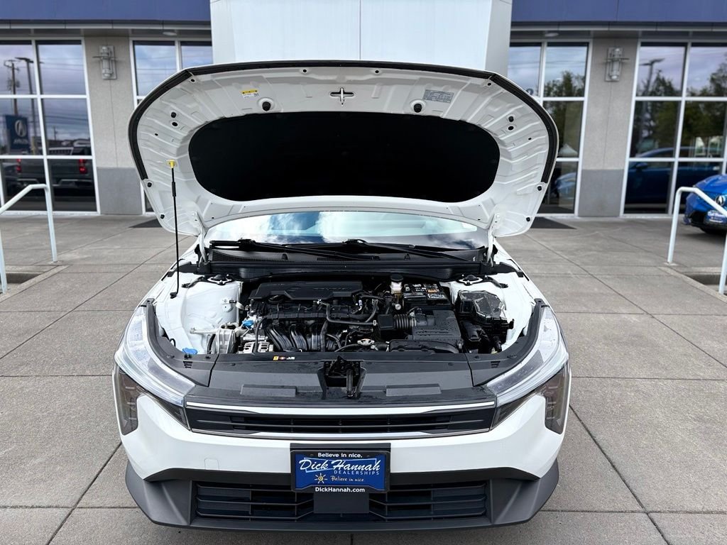 Used 2025 Snow White Pearl Kia LX image 3