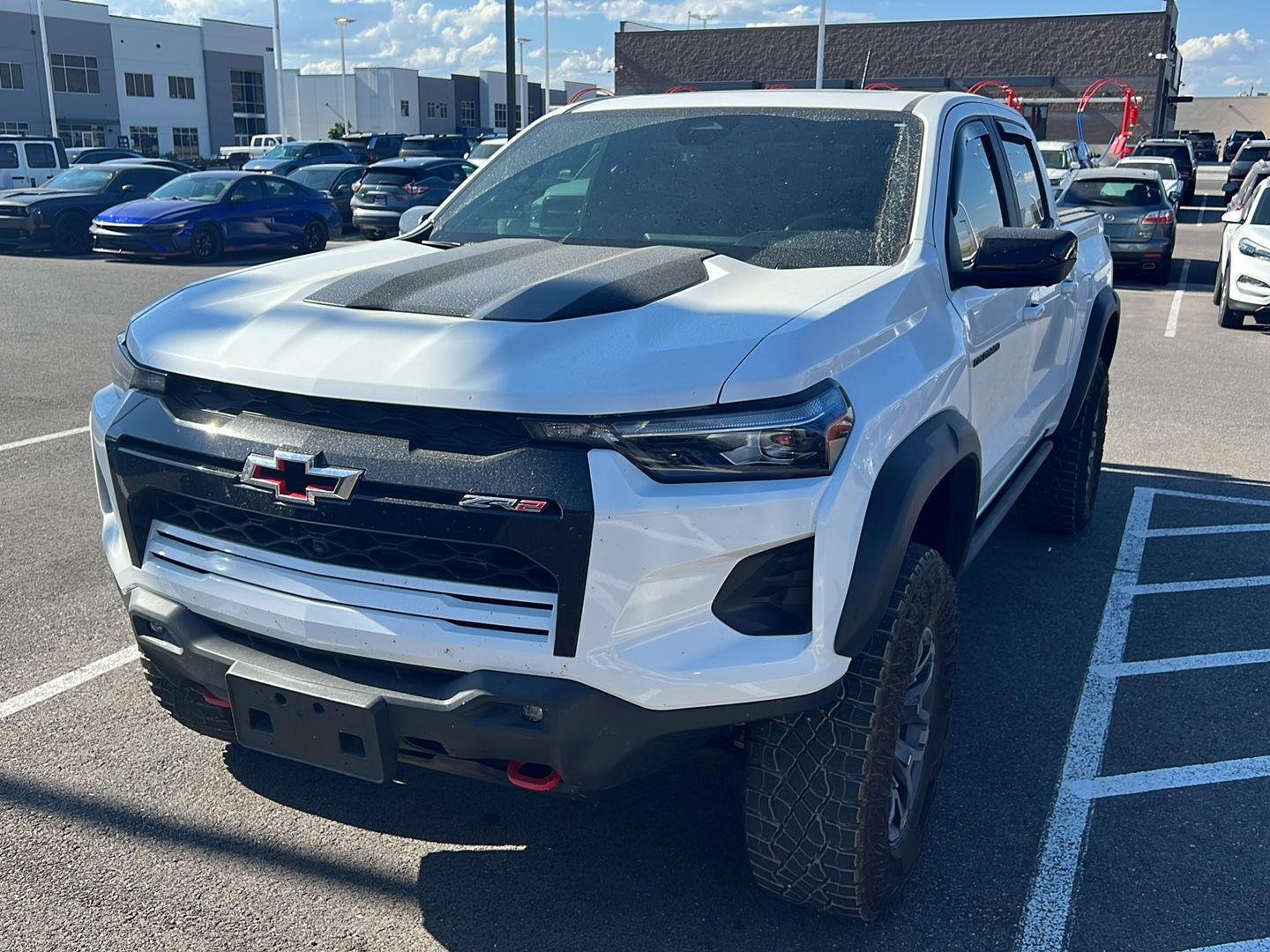 Used 2024 Summit White Chevrolet 4WD ZR2 image 1