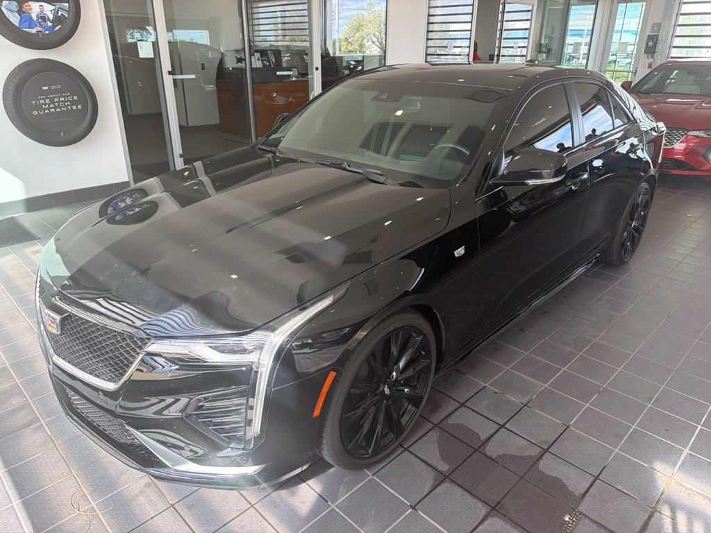Used 2024 Black Cadillac Sport image 1