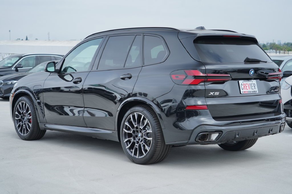 New 2026 Black Sapphire Metallic BMW xDrive50e image 8