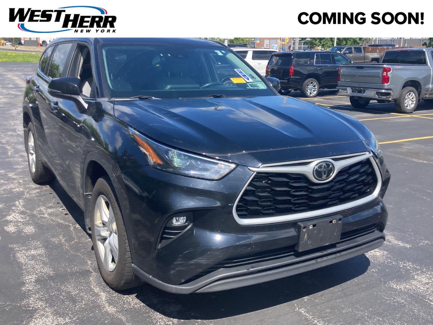 Used 2023 Midnight Black Metallic Toyota LE image 1
