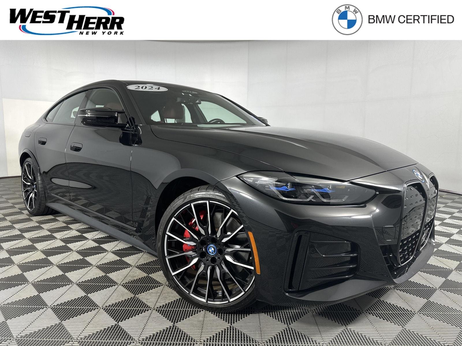 Certified Used 2024 Black Sapphire Metallic BMW M50 image 1