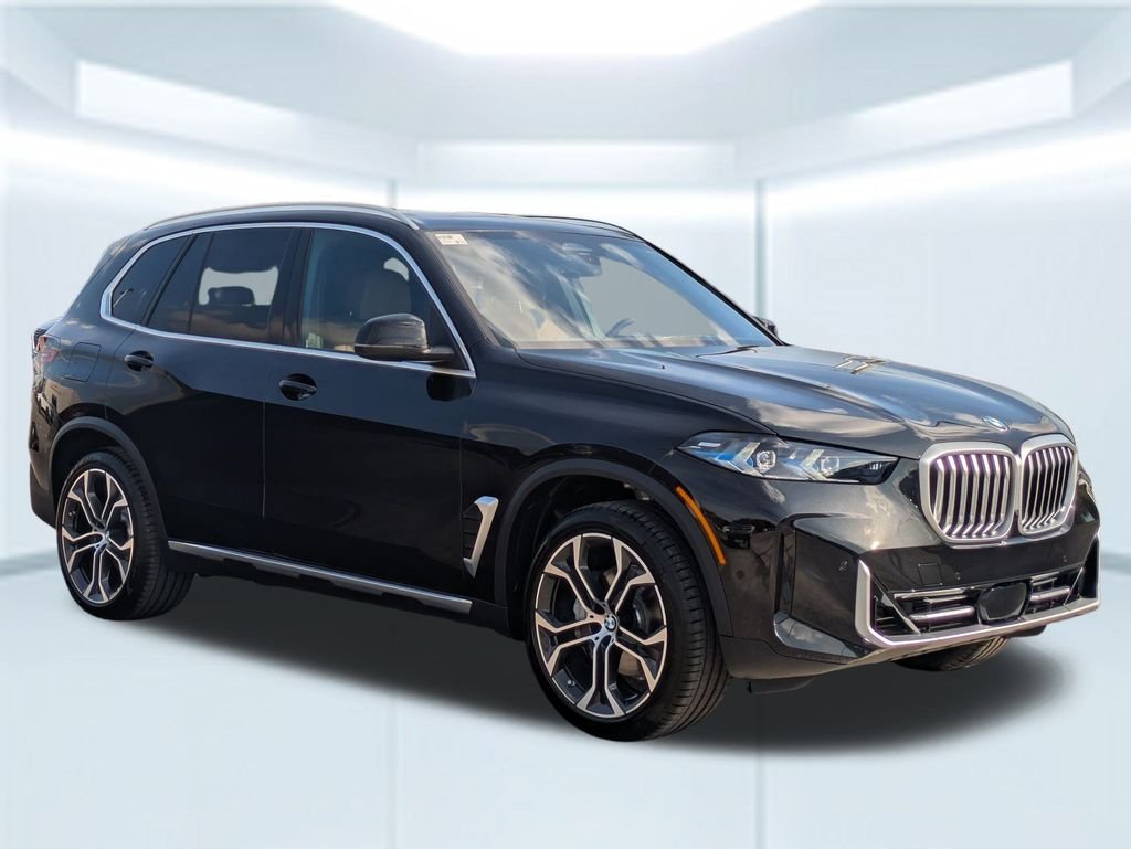 New 2026 Black Sapphire Metallic BMW sDrive40i image 7