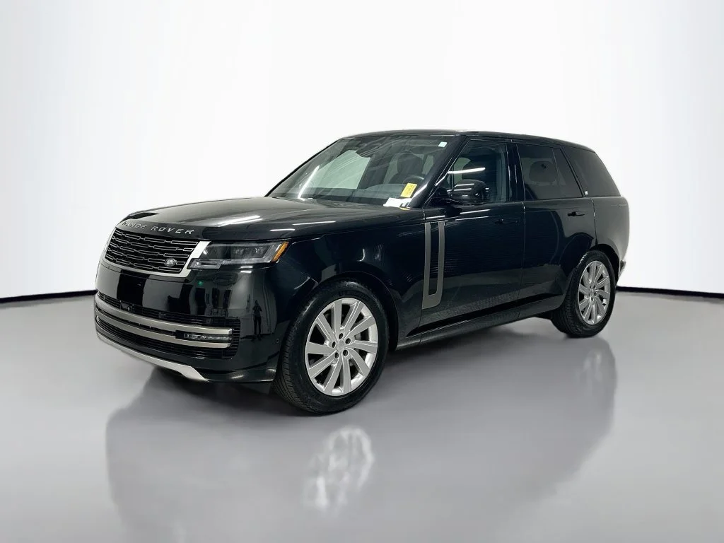 Used 2024 Santorini Black Metallic Land Rover SE image 1
