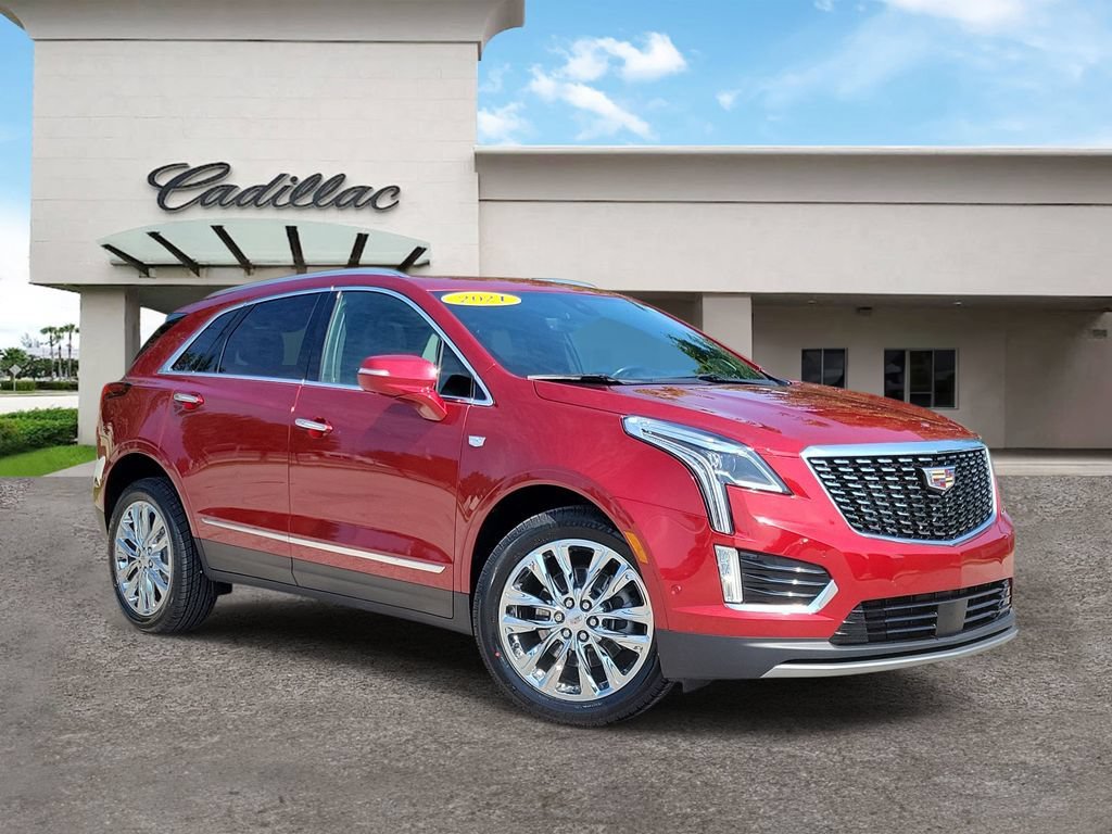 Used 2021 INFRARED TINTCOAT Cadillac AWD Premium Luxury image 1