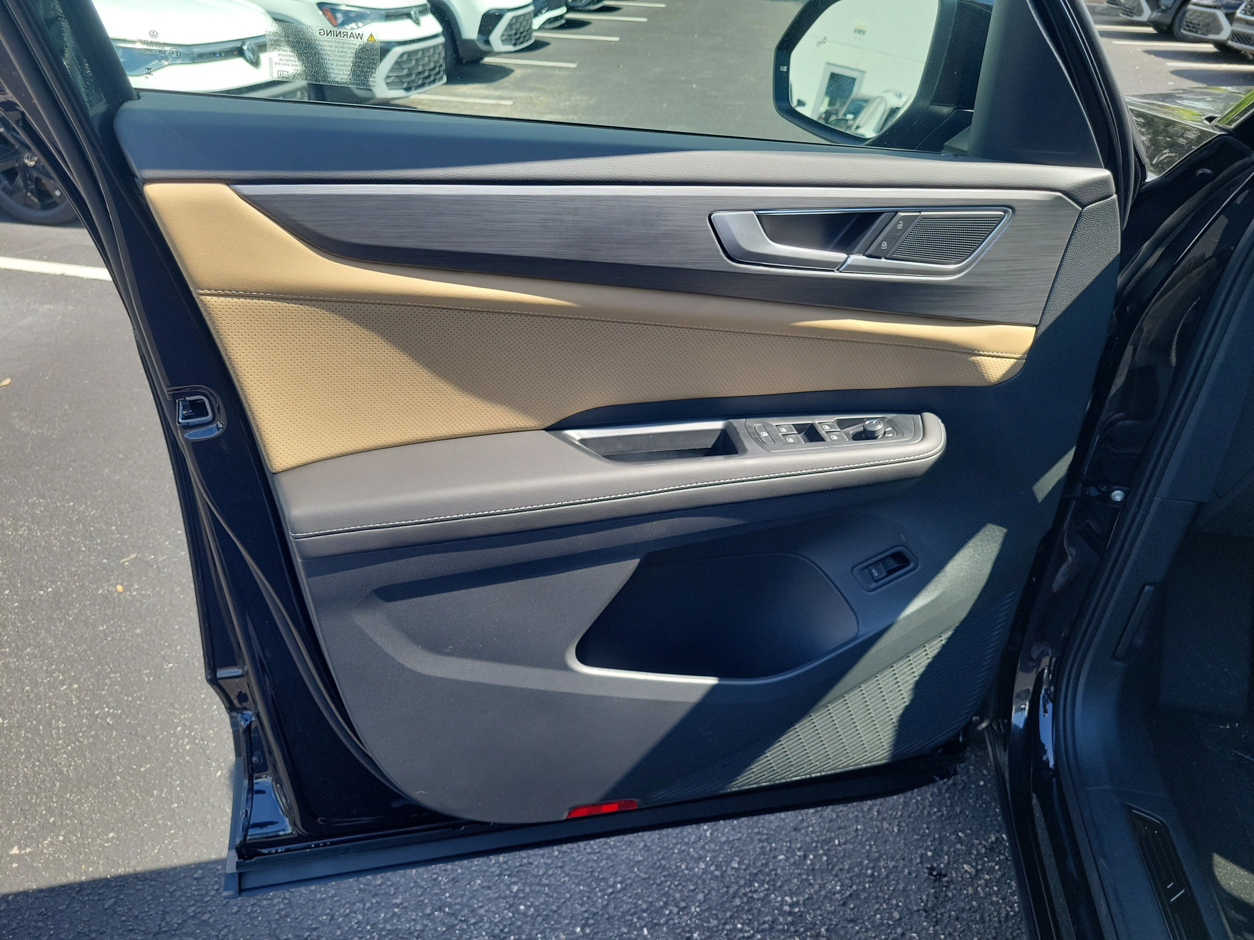 New 2026 Black Volkswagen SE w/Technology image 19