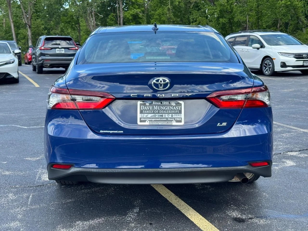 Used 2024 Reservoir Blue Toyota LE image 6