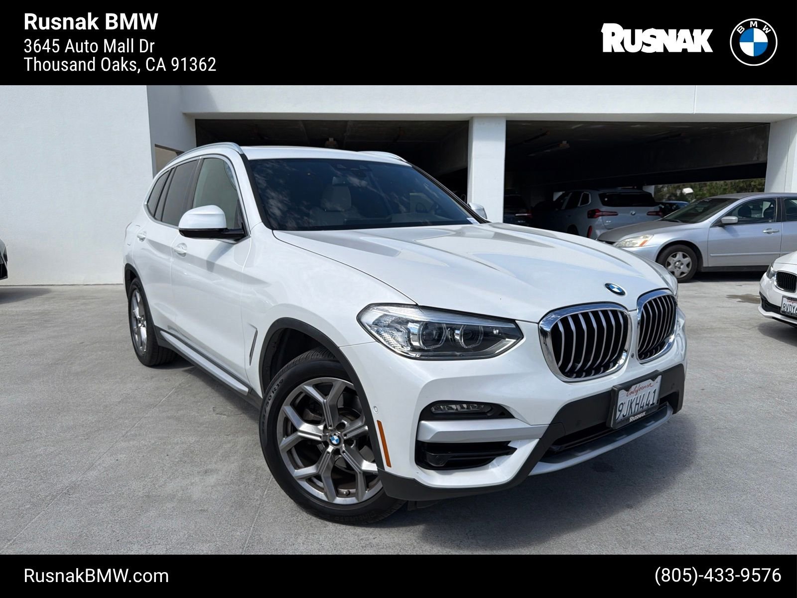 Used 2021 Mineral White Metallic BMW sDrive30i image 1