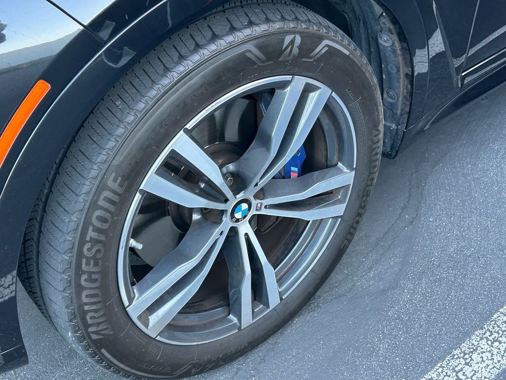 Certified Used 2024 Black Sapphire Metallic BMW M60i image 3