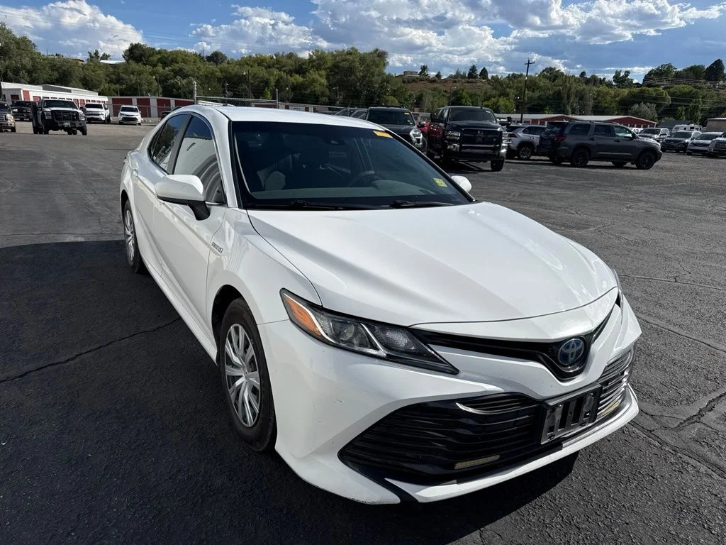 Used 2018 Super White Toyota LE image 1