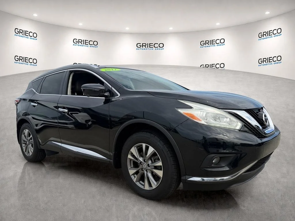 Used 2017 Black Nissan SL image 1