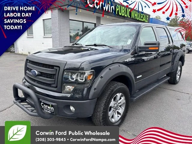 Used 2014 Tuxedo Black Metallic Ford  image 1