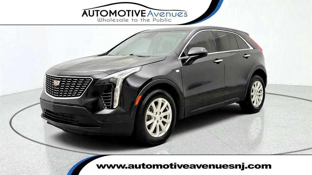 Used 2023 Stellar Black Metallic Cadillac FWD 4dr Luxury w/ Driver Awareness Package image 1