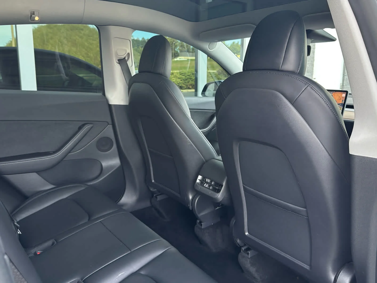Used 2022 Solid Black Tesla Performance image 12