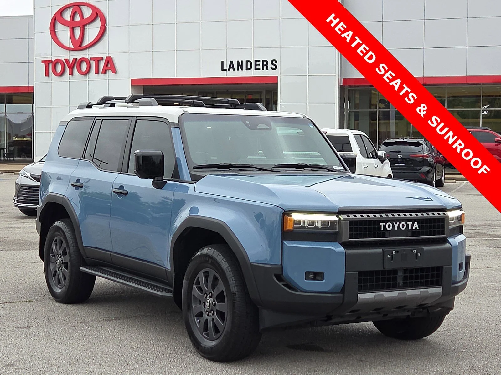 Used 2024 Heritage Blue/Gray Scape Toyota 4DR 4WD image 1