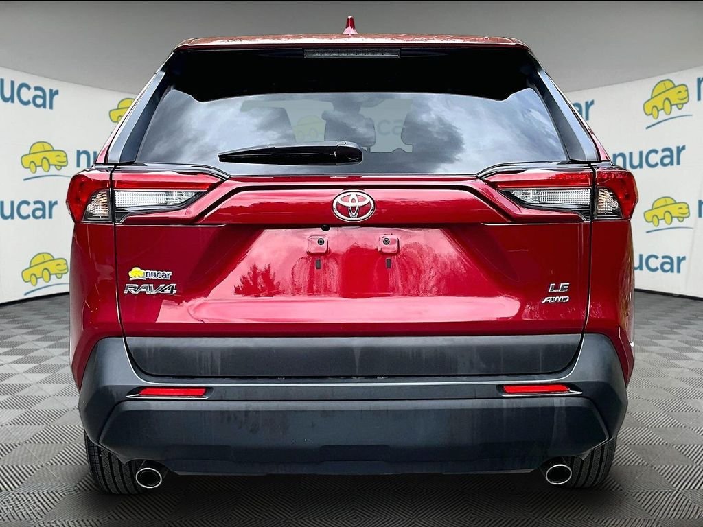 Used 2024 Red Toyota LE image 7