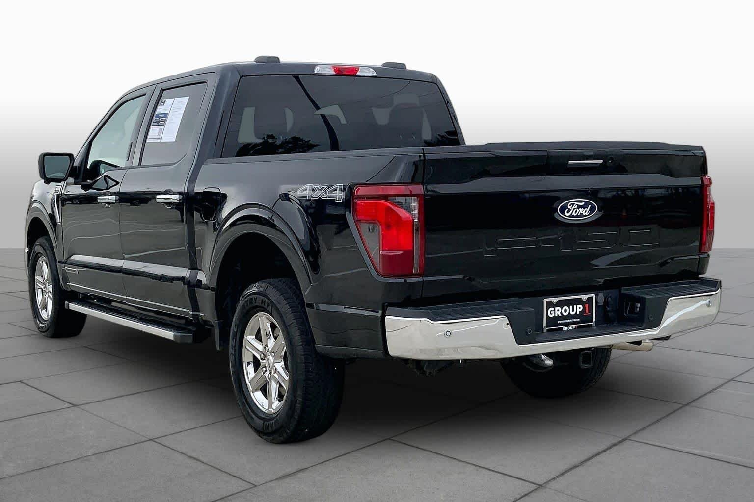 Used 2024 Agate Black Metallic Ford XLT image 19