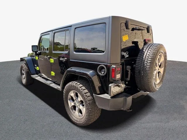 Used 2017 Black Jeep Unlimited Sahara image 2