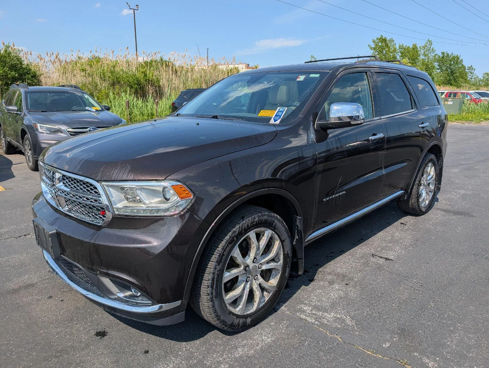 Used 2016 Luxury Brown Pearlcoat Dodge Citadel image 4