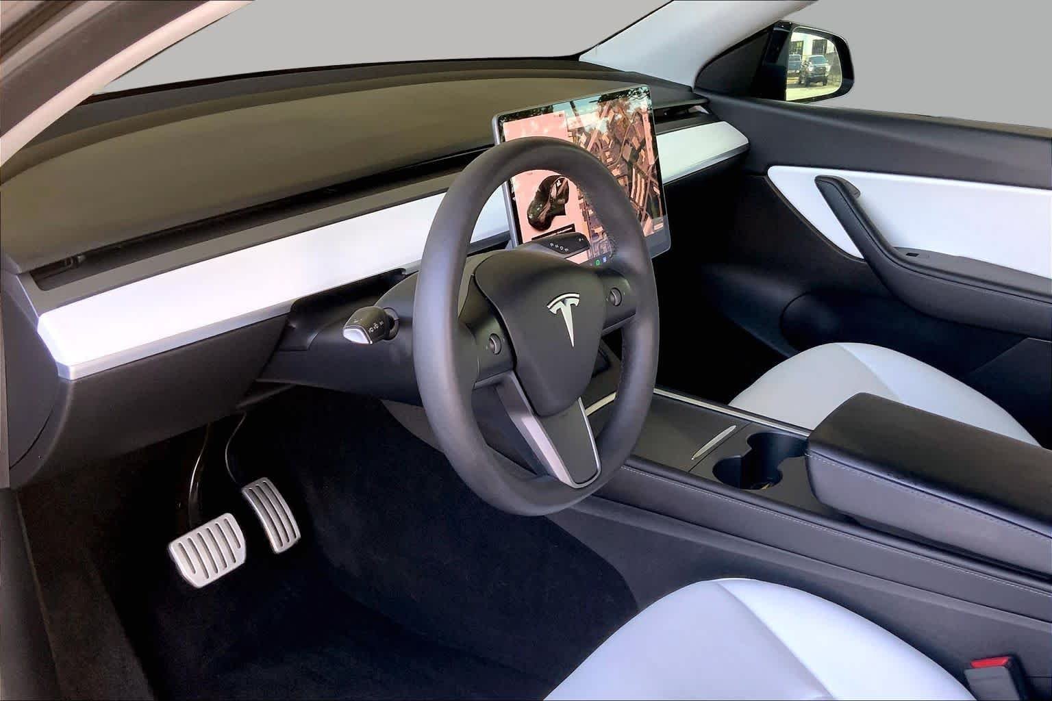 Used 2021 Solid Black Tesla Performance image 17