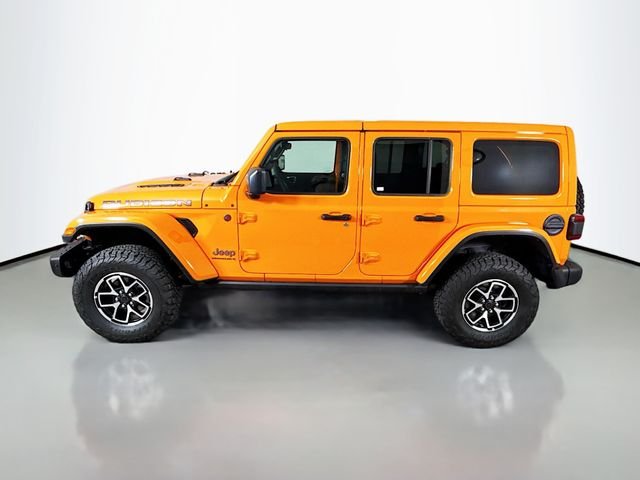 Used 2025 Orange Jeep Rubicon image 4