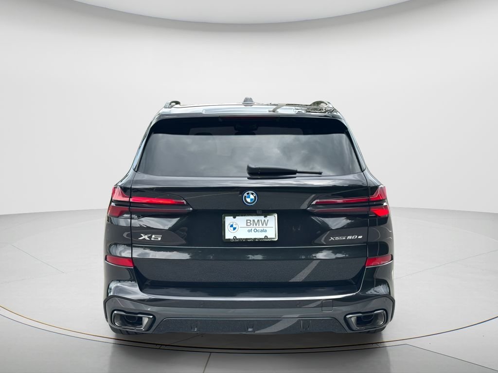 New 2026 Black Sapphire Metallic BMW xDrive50e image 6