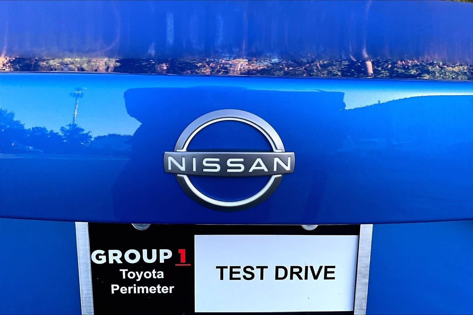 Used 2024 Electric Blue Metallic Nissan SV image 31