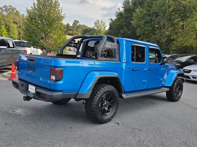 Used 2024 Blue Jeep Sport image 9