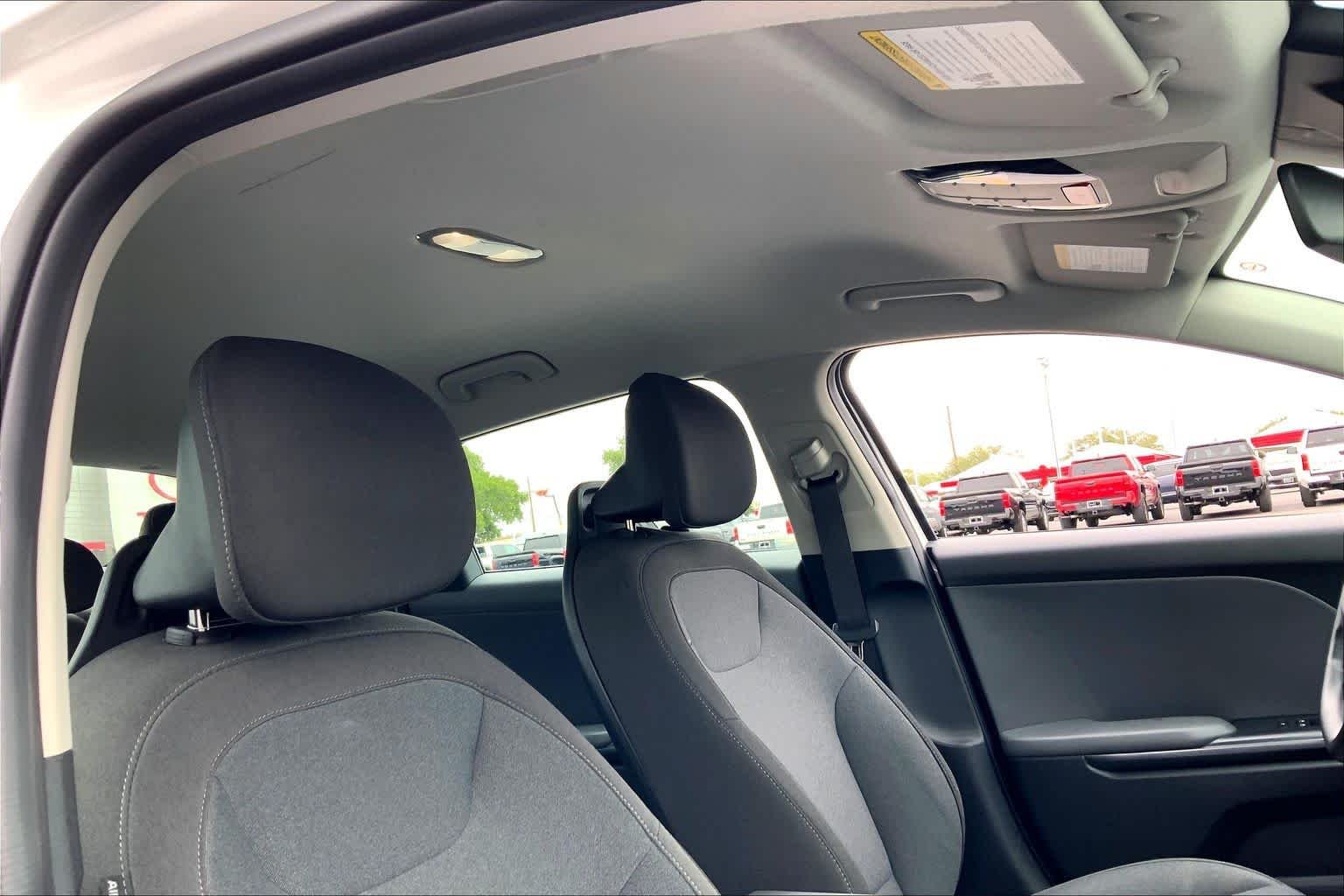 Used 2025 Snow White Pearl Kia LXS image 14