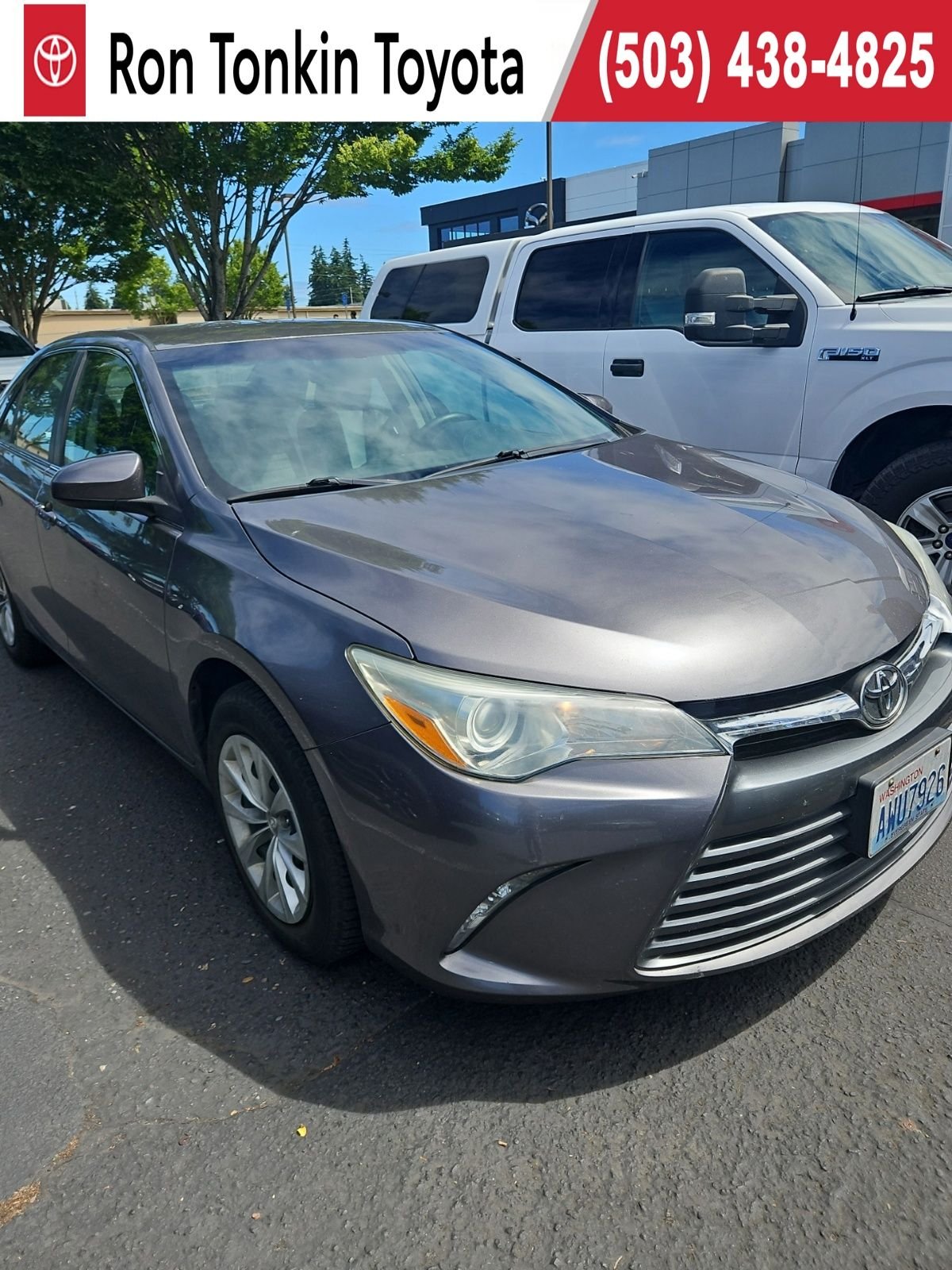 Used 2015 Predawn Gray Mica Toyota LE image 1