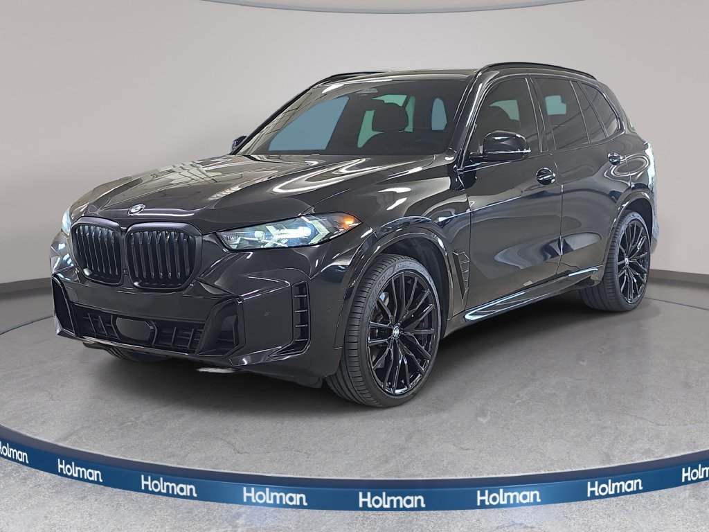 Certified Used 2025 Black Sapphire Metallic BMW sDrive40i image 1