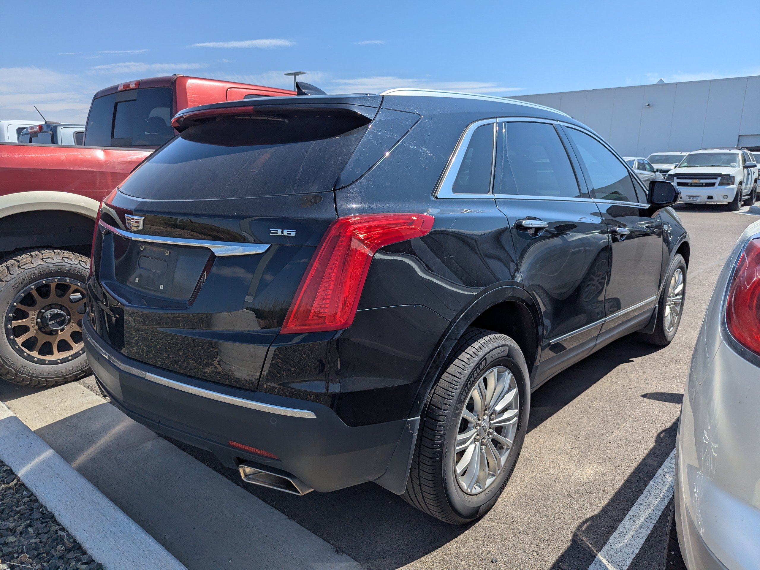 Certified Used 2018 STELLAR BLACK METALLIC Cadillac FWD image 4