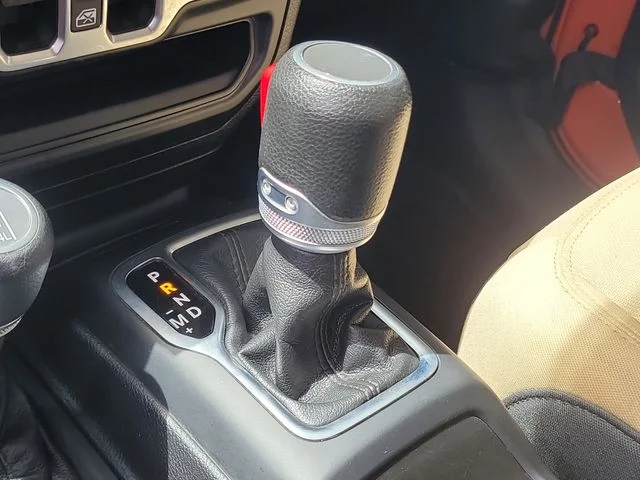 Used 2020 Orange Jeep Sport image 24