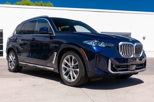 New 2026 Tanzanite Blue II Metallic BMW xDrive50e image 8