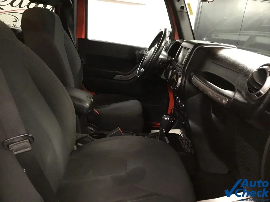 Used 2015 Orange Jeep Unlimited Sport image 38