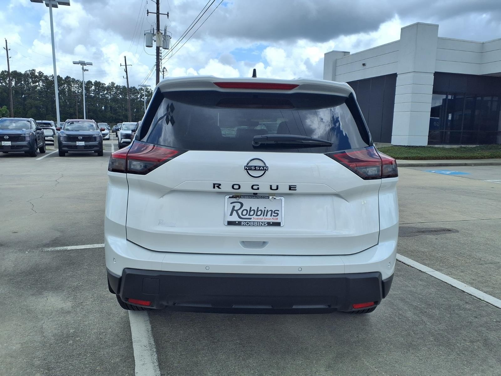 2026 Nissan Rogue Dark Armor™ White at Robbins Nissan