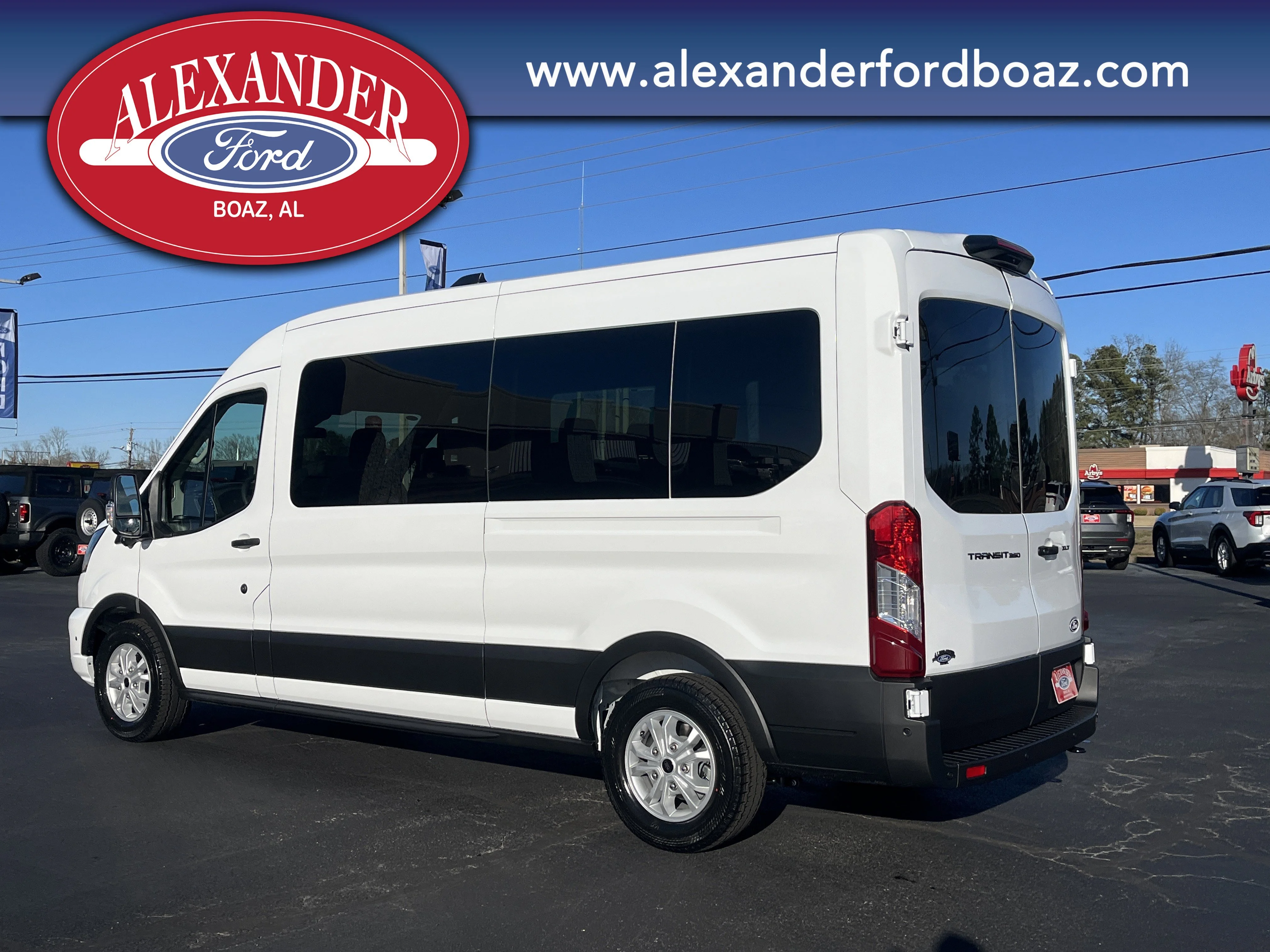 New 2026 Oxford White Ford Passenger Van XLT image 2