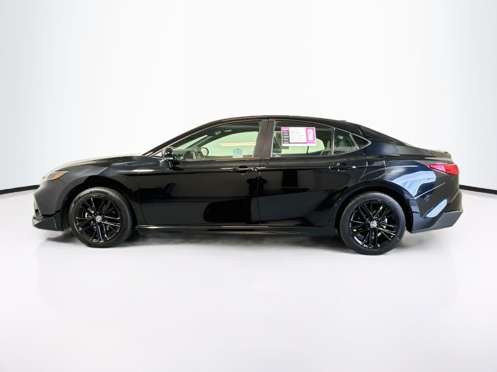 Used 2025 Midnight Black Metallic Toyota SE image 2