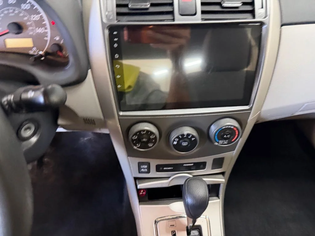 Used 2012 Barcelona Red Metallic Toyota LE image 18