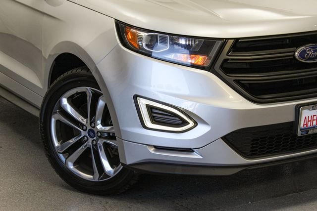 Used 2015 Ingot Silver Metallic Ford Sport image 2