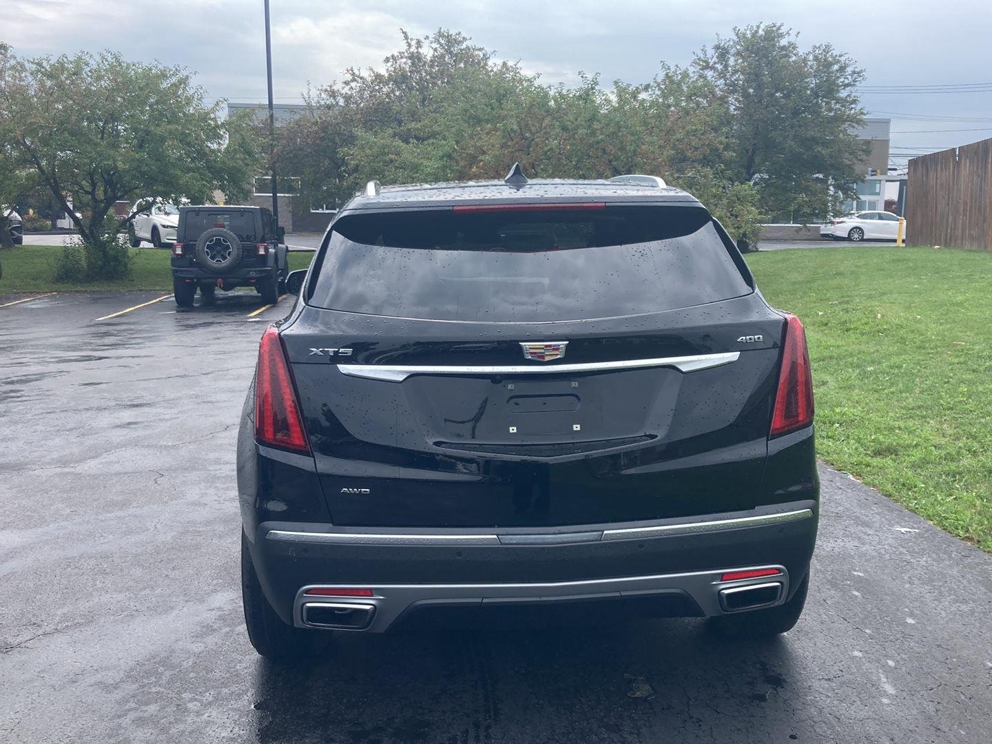 Used 2023 Stellar Black Metallic Cadillac AWD Premium Luxury image 6