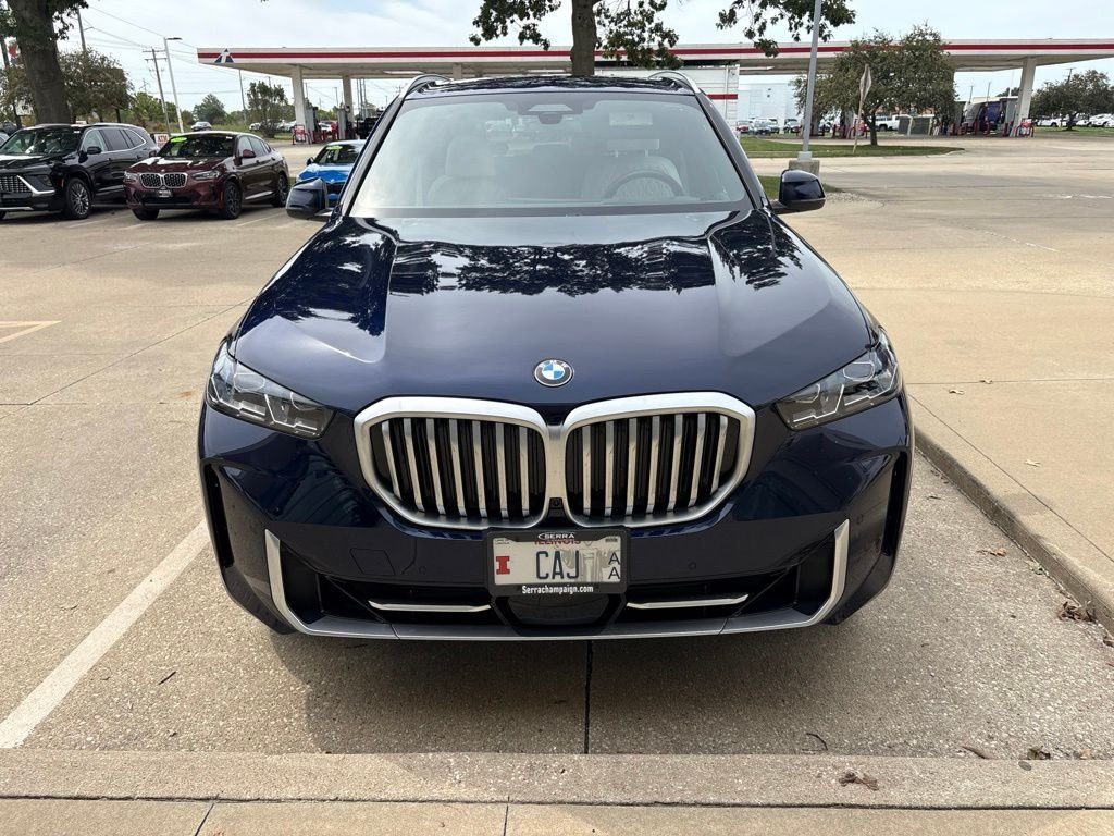 Used 2025 Tanzanite Blue II Metallic BMW xDrive40i image 1