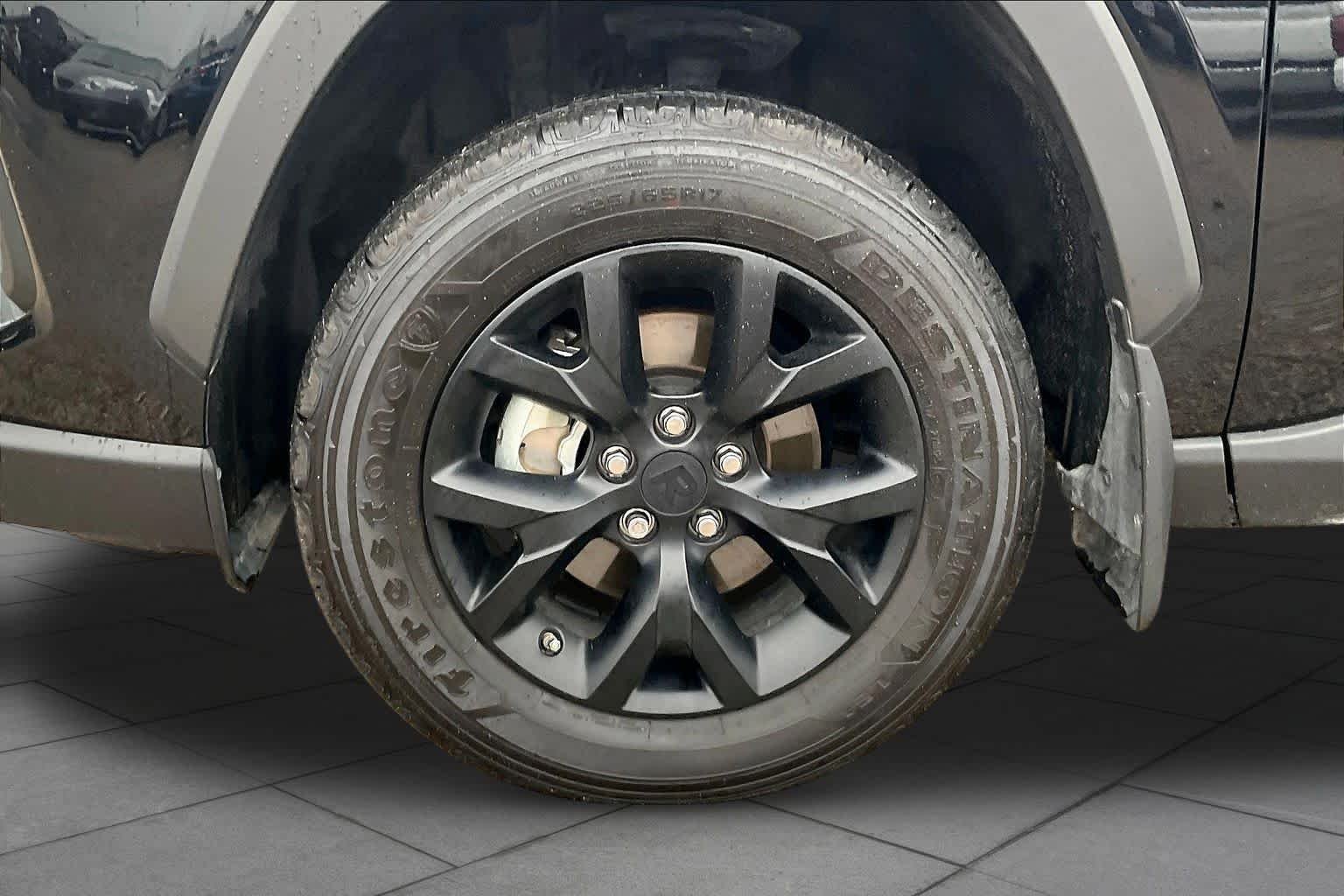 Used 2025 Midnight Black Metallic Toyota LE image 11