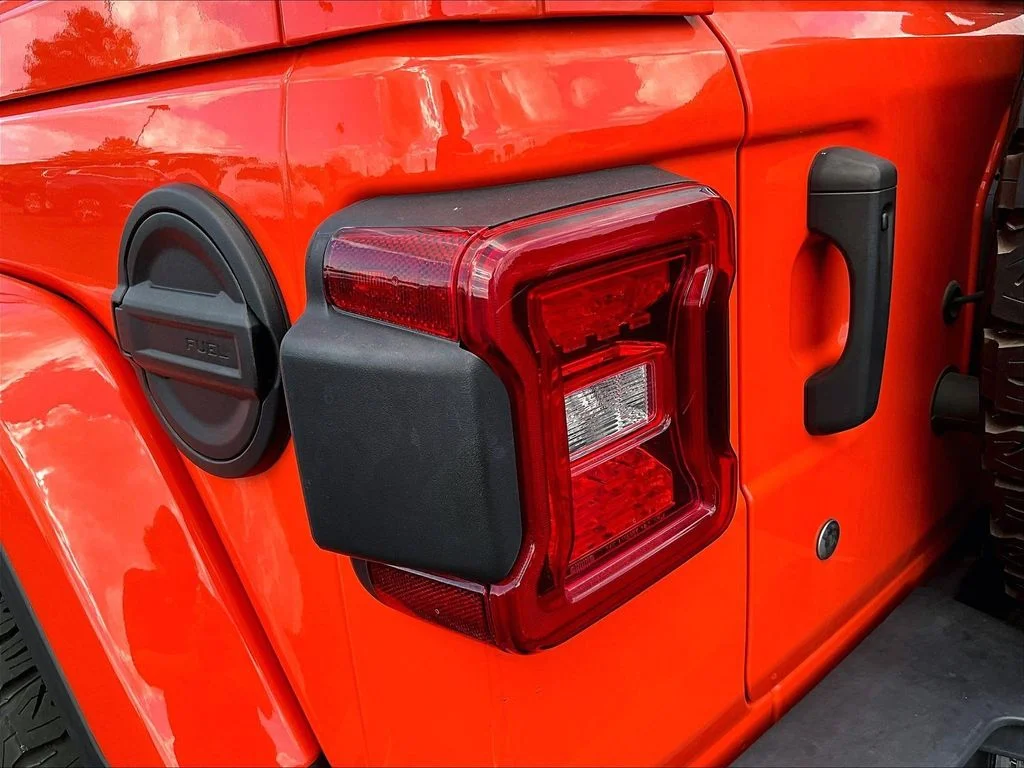 Used 2018 Orange Jeep Unlimited Sahara image 29