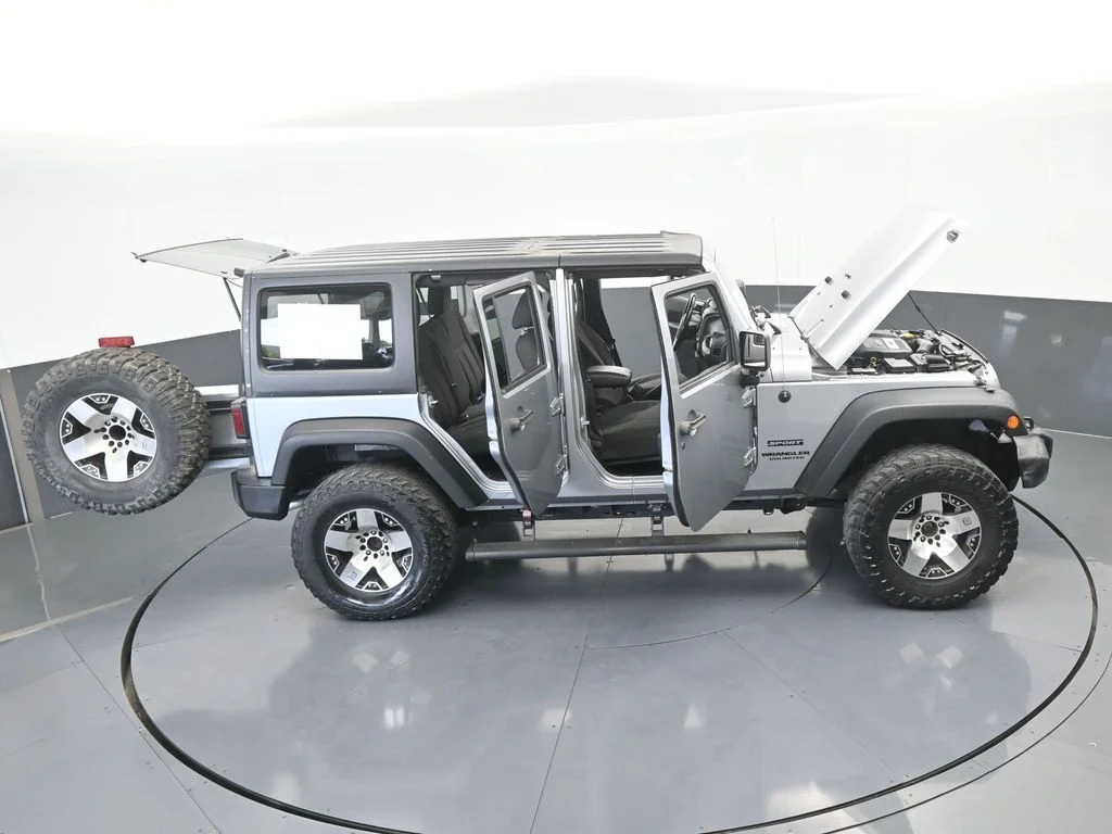 Used 2016 Billet Silver Metallic Clearcoat Jeep Unlimited Sport image 60