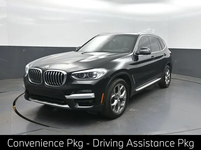 Used 2020 Black BMW xDrive30i image 1