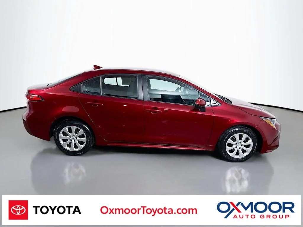 Certified Used 2023 Ruby Flare Pearl Toyota LE image 1